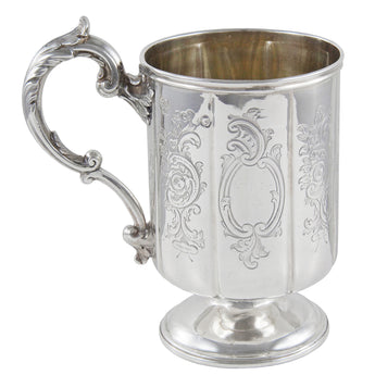 A Victorian, silver, child's engraved mug with a gilt interior.