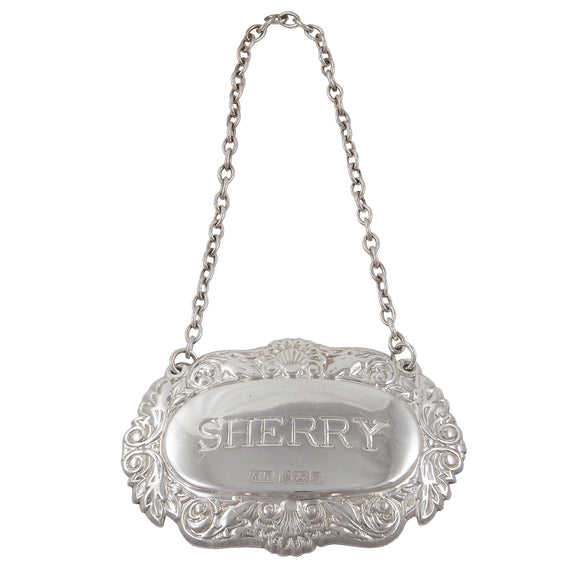 A modern, silver, sherry decanter label