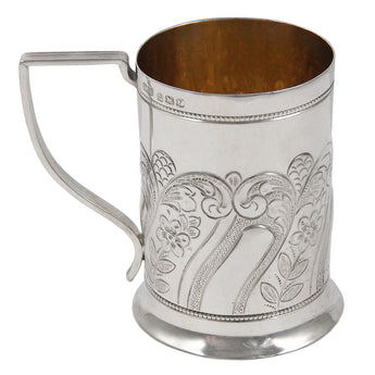 An early 20th century, silver, child's mug with a pale gilt interior