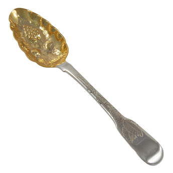 A Georgian, silver berry spoon with a gilded bowl decorated with embossed fruit & foliage, a scalloped edge & engraved foliate decoration to the handle.