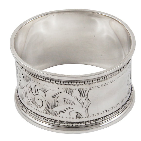 An early 20th century, silver, engraved napkin ring