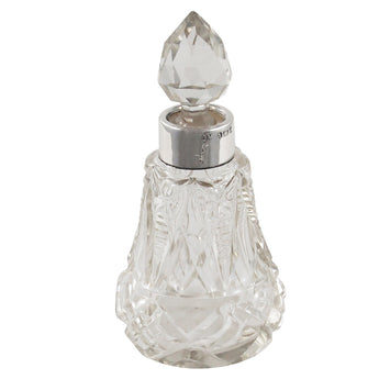 An Edwardian, glass scent bottle with a silver mount & glass stopper