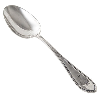 A Victorian, silver teaspoon with a decorative border on the handle & vacant cartouche.