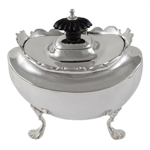An Edwardian, silver tea caddy with a scalloped rim, ebonised finial & four feet.