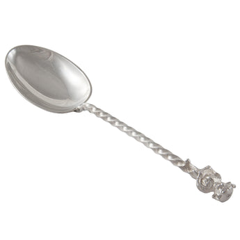 An Edwardian, silver teaspoon with a Lincoln Imp on the terminal end.