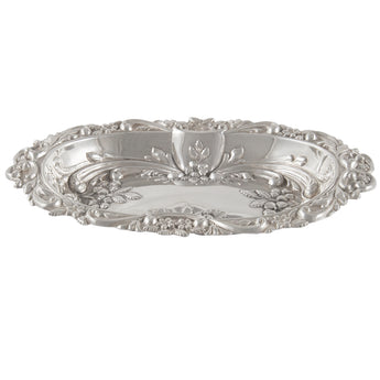 An Edwardian, silver, embossed pin dish.