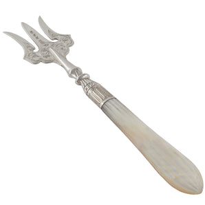 A Victorian, silver bread fork with a mother of pearl set handle.