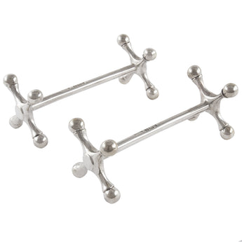 A pair of Edwardian, silver knife rests.