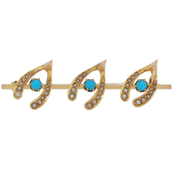 An Edwardian, yellow gold, turquoise & pearl set, three wishbone bar brooch