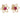 A pair of modern, yellow gold, ruby set stud earrings.