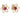 A pair of modern, yellow gold, ruby set stud earrings.