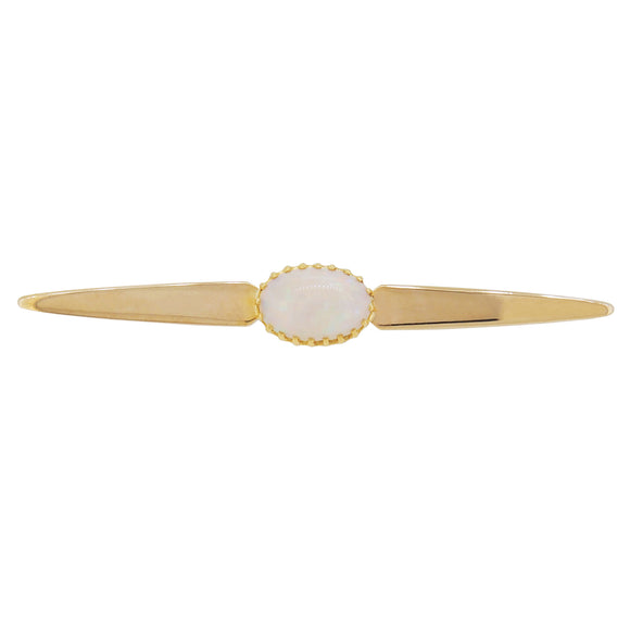 A modern, 9ct yellow gold, opal set bar brooch.