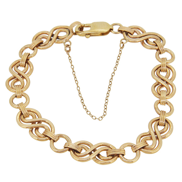 A modern, 9ct yellow gold, figure of eight link bracelet.