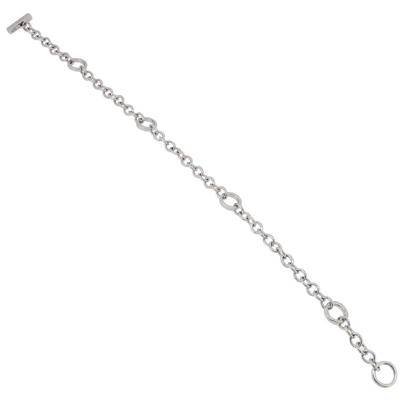 A modern, silver, circular link bracelet