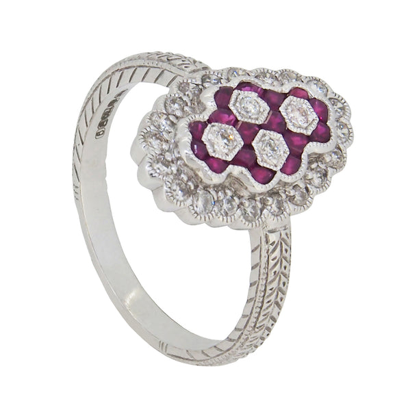 A modern, 18ct white gold, ruby & diamond set cluster ring