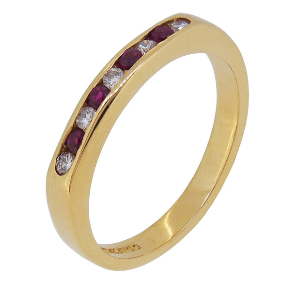 A modern, 18ct yellow gold, ruby & diamond set, nine stone half eternity ring