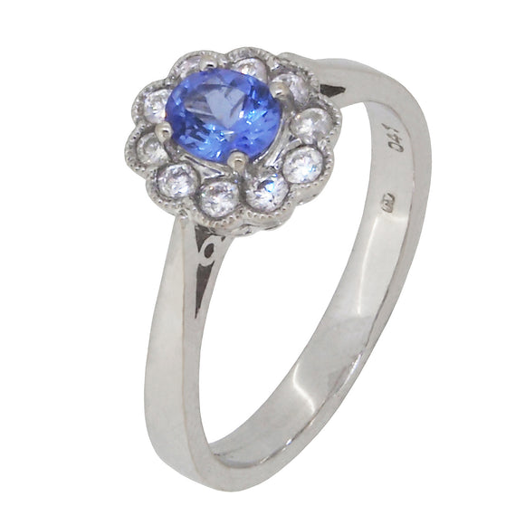 A modern, 18ct white gold, tanzanite & diamond set cluster ring