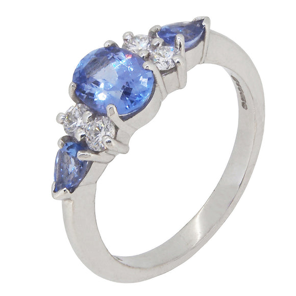 A modern, 18ct white gold, tanzanite & diamond set, seven stone ring