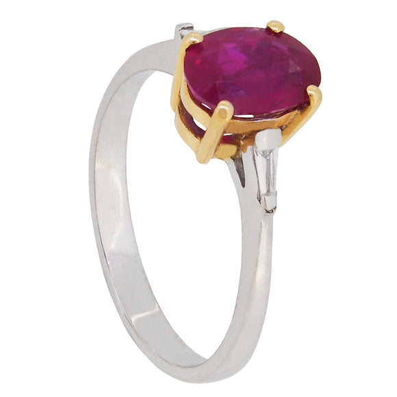 A modern, 18ct white & yellow gold, ruby & diamond set, three stone ring