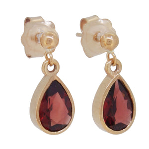 A pair of modern, 9ct yellow gold, garnet set drop earrings