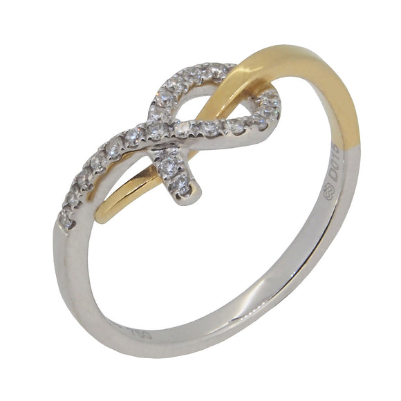 A modern, 18ct yellow & white gold, diamond set knot ring