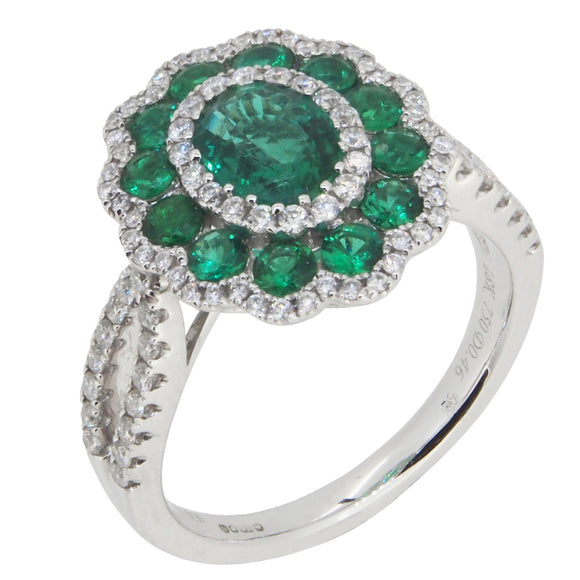 A modern, 18ct white gold, emerald & diamond set cluster ring