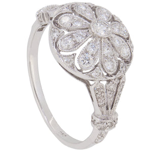 A modern, 18ct white gold, diamond set cluster ring.