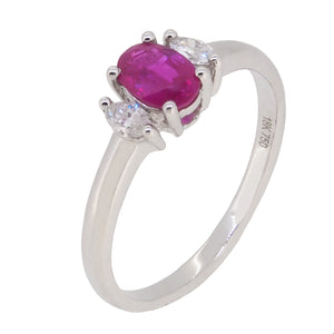 A modern, 18ct white gold, ruby & diamond set, three stone ring