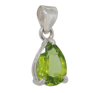 A modern, silver, peridot set pendant