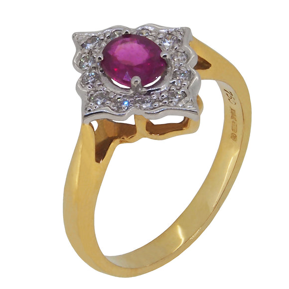 A modern, 18ct yellow & white gold, ruby & diamond set cluster ring
