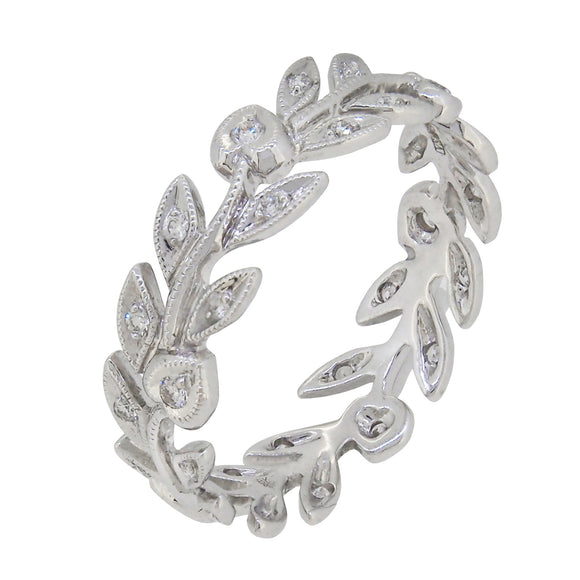 A modern, 18ct white gold, diamond set, leaf pattern band ring