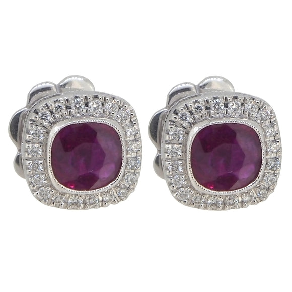 A pair of modern, 18ct white gold, ruby & diamond set, cushion shaped cluster stud earrings