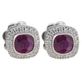 A pair of modern, 18ct white gold, ruby & diamond set, cushion shaped cluster stud earrings