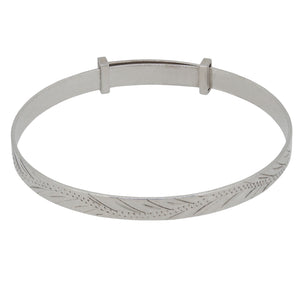 A modern, silver, wave design, child's expanding bangle