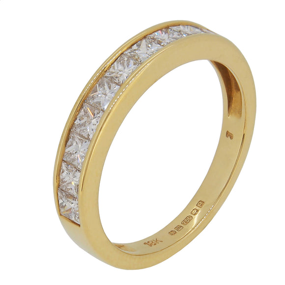 A modern, 18ct yellow gold, diamond set half eternity ring