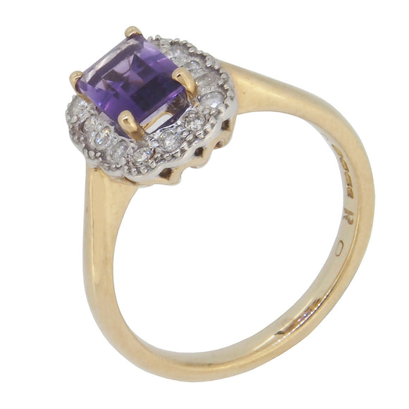 A modern, 9ct yellow gold, amethyst & diamond set cluster ring.