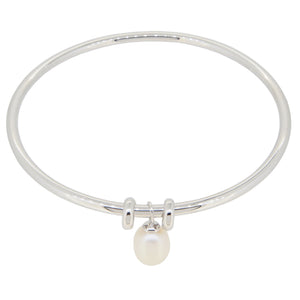 A modern, silver, drop pearl set bangle