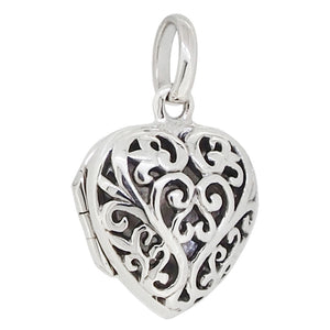 A modern, silver, heart shaped locket with a pierced front