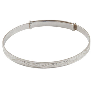 A modern, silver, adult's expanding bangle