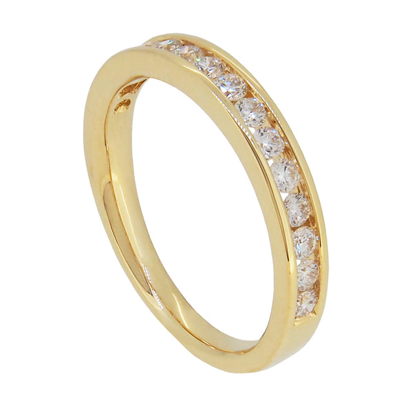 A modern, 18ct yellow gold, diamond set half eternity ring