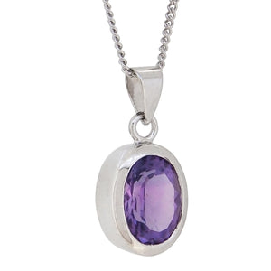 A modern, silver, amethyst set pendant & chain