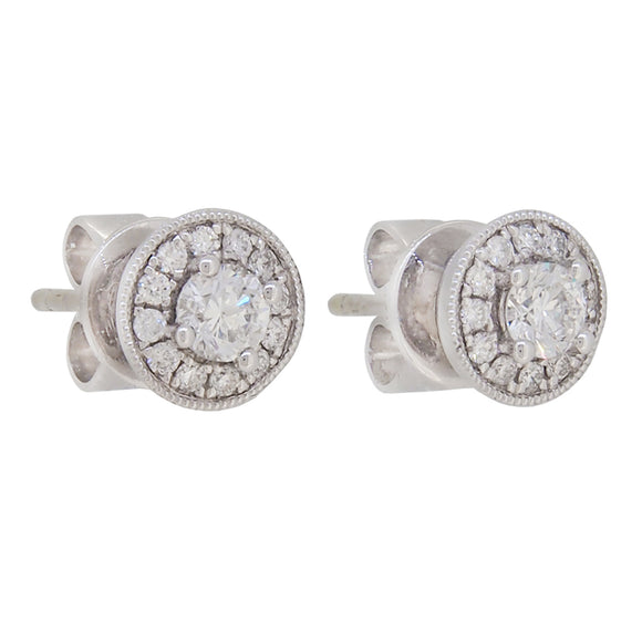 A pair of modern, 18ct white gold, diamond set cluster stud earrings.