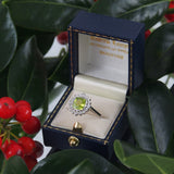 A platinum, peridot & diamond set cluster ring.