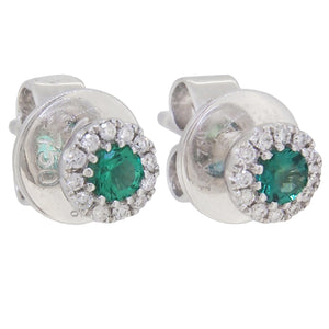 A pair of modern, 18ct white gold, emerald & diamond set cluster stud earrings
