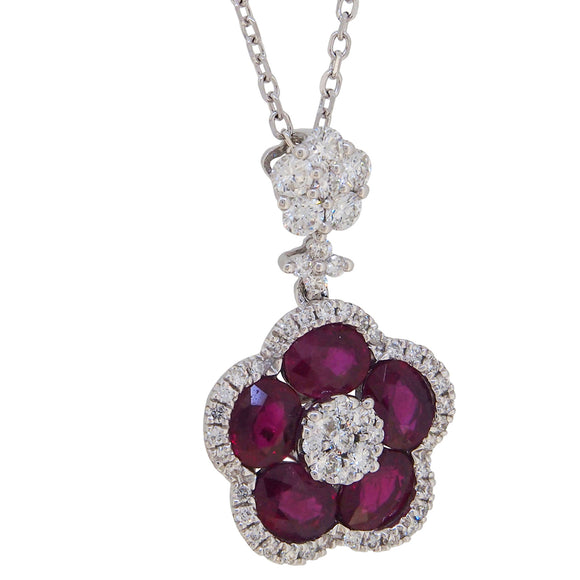 A modern, 18ct white gold, ruby & diamond set cluster pendant & chain