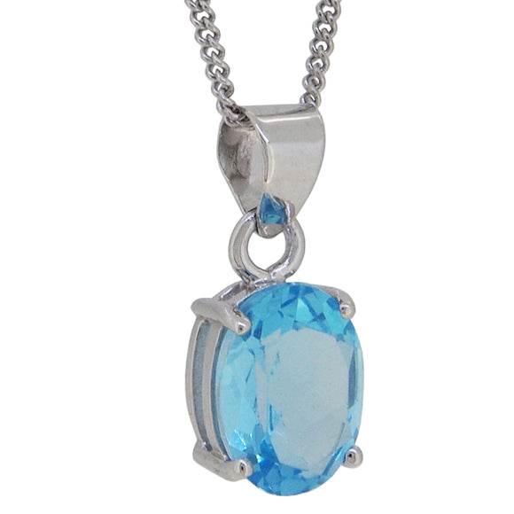 A modern, silver, blue topaz set pendant & chain