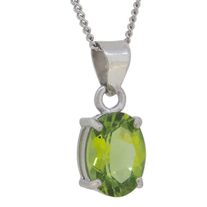 A modern, silver, peridot set pendant & chain