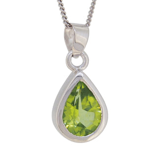 A modern, silver, peridot set pendant & chain.