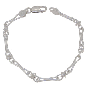 A modern, silver, circular & oval link bracelet.