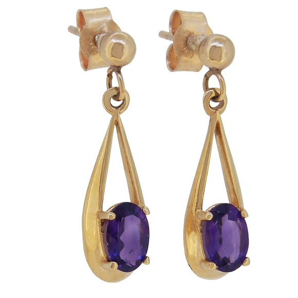 A pair of modern, 9ct yellow gold, amethyst set drop earrings